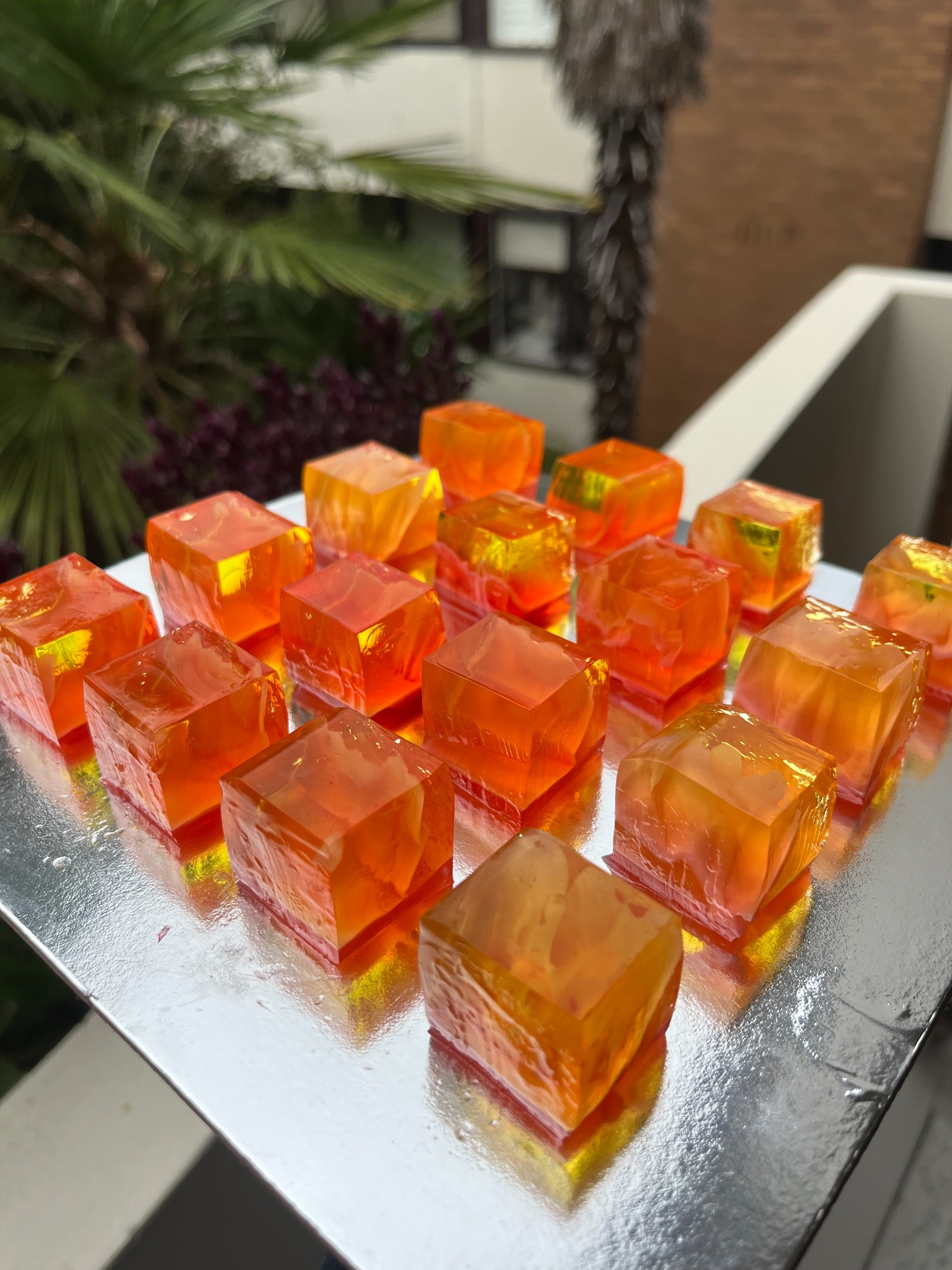 Orange cocktail-inspired Wobble Bites on a silver tray